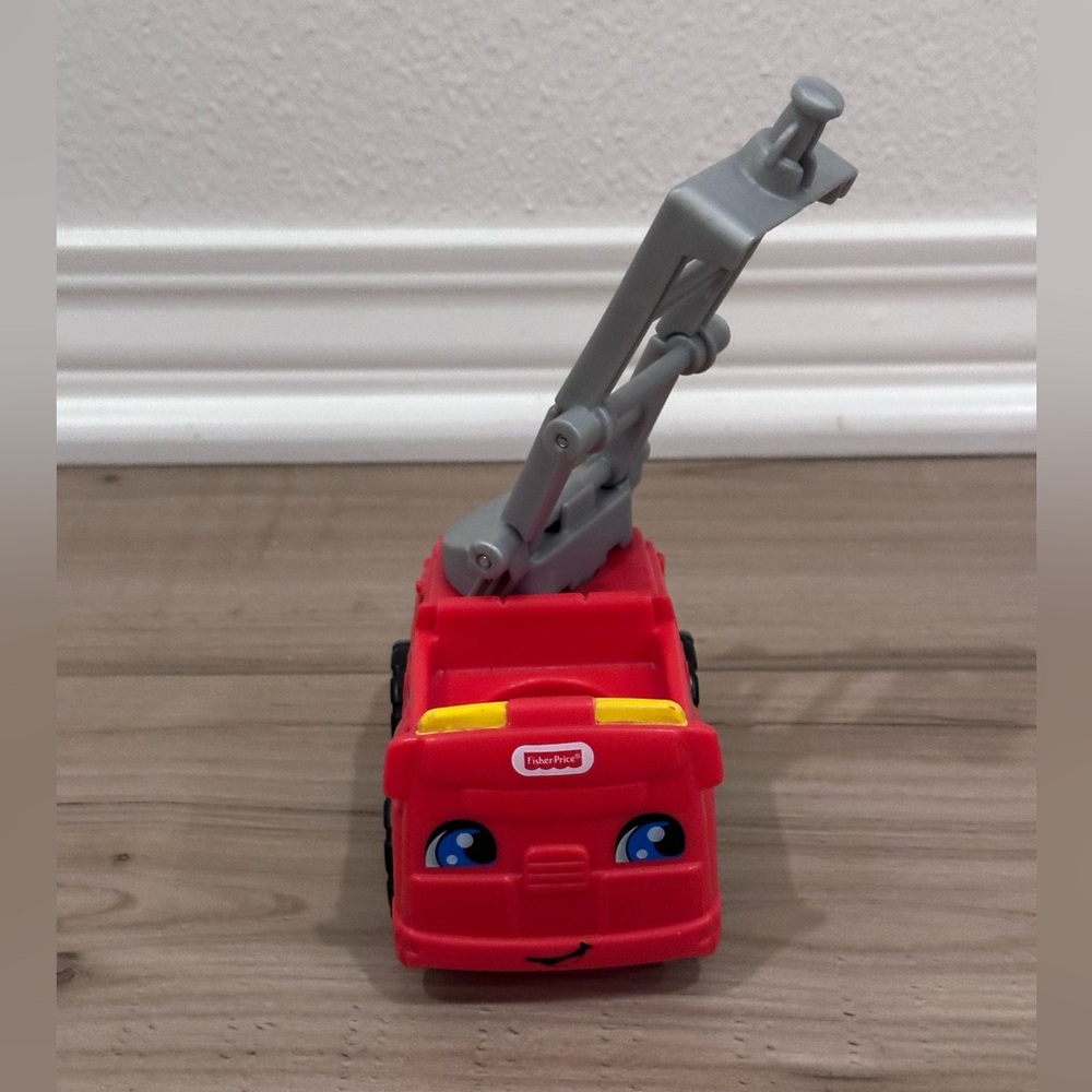 Fisher-Price Little People Smiling Red Fire Engine with Gray Ladder